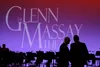 Mat-Su Concert Band Conductor Gleo Huyck and Mat-Su College Director Talis Colberg share a quite moment on stage Feb. 7 after opening ceremonies for the new Glenn Massay Theater at Mat-Su Col