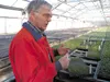 Ben VanderWeele talks inside a greenhouse at VanderWeele Farms. Submitted photo