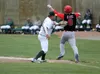Mat-Su Miners infielder Spencer Henson puts the tag on Matthew Kirk of the Peninsula Oilers along the first base line during an 8-7 win over the Oilers. JEREMIAH BARTZ/ Frontiersman