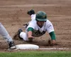 Mat-Su's Hunter Jump slides back into first base during a 2-0 loss to the Peninsula Oilers Tuesday, June 12, 2018, at Hermon Brothers Field in Palmer. JEREMIAH BARTZ/ Frontiersman