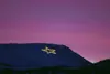 Star lit on Mount Gordon Lyon, undated. Courtesy of the JBER Historian’s office.