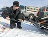 Willow musher Dallas Seavey attaches a tow line to his sled before the March 4 start of the 40th running of the Iditarod Trail Sled Dog Race in Willow. Seavey won the 2012 Iditarod, becoming 