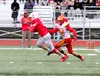 Wasilla's Max Larson breaks a tackle en route to a long touchdown catch and run during a loss to West Valley. Jeremiah Bartz/Frontiersman