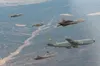 F-22 Raptors and F-16 Fighting Falcons from the 422nd Test and Evaluation Squadron refuel from a KC-135 Stratotanker over the Nevada Test and Training Range, Nov. 17, 2020 for Large Force Tes