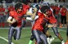 Wasilla running back Sean McDermott follows blocker Matthew Trask during a 42-6 loss to Chugiak Saturday, Sept. 23, 2017, at Wasilla High School. Courtesy of Bruce Eggleston/matsusports.net