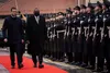 Secretary of Defense Lloyd J. Austin III is welcomed to Lithuania by Acting Minister of Defense Garbrielius Landsbergis during a ceremony in Vilnius, Lithuania, Feb. 19, 2022. Austin arrived 