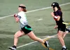 Colony's Ella Richardson races to the end zone after making a catch during the second half of a girls flag football win over rival Wasilla Tuesday night at Wasilla High's Veterans Memorial Fi