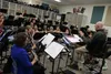 The Mat-Su Concert Band reunites inside Teeland Middle School. Jacob Mann/Frontiersman
