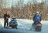 Snowmachiners take a break while riding in the upper Susitna
Valley recently. Photo by AMY MENEREY/Frontiersman.
