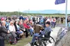 Keynote speaker Thomas Elam addresses a Memorial Day crowd of several hundred people at the Veterans Wall of Honor Monday, including Gov. Bill and Donna Walker, Palmer Mayor DeLena Johnson, W