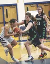Redington's Abbie Fuller and Homer's Rylee Doughty tussle over the ball during a Friday, Feb. 21, 2020 basketball game in the Alice Witte Gymnasium in Homer, Alaska. Photo by Megan Pacer/Home