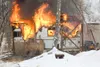 Flames fully engulf a Winnebago R.V off N. Tanana Drive in
Wasilla Friday afternoon. A trailer and several cars in close
proximity were saved due to a quick response from the Mat-Su
Central F