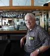 Larry Vasanoja relaxes at the bar in the Palmer Elks Club.
Tonight, Larry celebrates his 80th birthday at the Elks' Purple
Bubble Charity Ball. Photo by DANIEL SPOTH/Frontiersman.