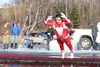Jerry Famolari leaps into Finger Lake during Mat-Su Sertoma's Polar Plunge on Saturday. CAITLIN SKVORC/Frontiersman.com