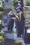 Wasilla's Vicki Hewitt accepts her master’s degree in education
at the University of Alaska Anchorage commencement ceremony May 1
at the Sullivan Arena in Anchorage. (Courtesy of HEATHER A.
R