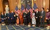Mary Peltola, smiling on the center-right, poses with House Speaker Nancy Pelosi, D-California, and Peltola’s family on Sept. 13, 2022, in Washington, D.C. Her husband Gene Peltola is between