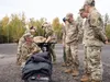 U.S. Air Force Maj. Joshua Brown, 673d Surgical Operations Squadron Surgical Services flight commander, presents the gear he used to complete the Iditarod Trail Invitational 1,000-mile ultram