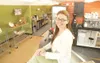 ROBERT DeBERRY/Frontiersman Christina Mulneaux is the proud
owner of Lotus, a new business in Wasilla that provides an unusual
assortment of products.