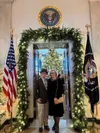 Karen and Ned Tri in front of the Blue Room Entrance. Courtesy photo