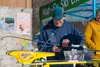 Mat-Su Ski Club coach Daryl Farrens waxes skis for attendees who want to try cross-country skiing at Government Peak Recreation Area on Saturday. J. David McChesney/Frontiersman