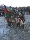 Danielle and Matthew Shramm, with children Brody and Paxton pose for a photo with a reindeer and Palmer’s resident elf during Colony Christmas on Dec. 10. MARY LOCKMAN/Frontiersman