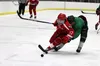 Colony's Jack Holman, right, tries to knock the puck away from Wasilla's Mason Mulneaux during Wasilla's 5-0 win over the Knights. Jeremiah Bartz/Frontiersman