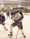Colony's Brad Peltz tries to get a handle on the puck during the
third period of Colony's 12-0 loss to Region III power Soldotna
Friday.JEREMIAH BARTZ/ Frontiersman