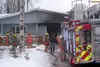 Mat-Su firefighters respond to a garage fire in Wasilla on Tuesday. ANDREW WELLNER/Frontiersman.com