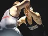 Wasilla’s Zech Rockstad grapples with teammate Quace Wright during the 2013 Lancer Smith Memorial at Palmer High School. ROBERT DeBerry/Frontiersman