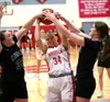 Wasilla's Claire Bredberg battles a pair of Knights for the ball during a win over Colony. Bruce Eggleston/matsusports.net