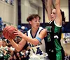 Palmer senior guard Amy Chapman tries to shift the ball past
Colony's Margaret Morris during Palmer's 38-36 win over the the
Knights at Palmer High School last Friday. The Moose win evened th