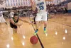 Colony basketball standout Antonio Bush, seen here diving for a ball against rival Palmer this past season, has an opportunity to play for an elite basketball squad this summer in tournaments