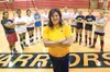 ROBERt DeBERRY/Frontiersman Wasilla Warrior volleyball head
coach Claudia Farias-Pinard stands with her 2010 varsity squad
Monday at Wasilla High School.