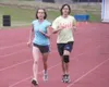 JEREMIAH BARTZ/Frontiersman Vera Hershey, left, runs with a
partner during a Valley Women’s Running Team practice on Tuesday at
the Palmer High School track. Hershey, the president of the tea