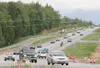 ROBERT DeBERRY/Frontiersman A steady stream of traffic moves along Knik-Goose Bay Road near Fairview Loop Friday evening. Beginning July 1, a stretch of Knik-Goose Bay Road from Mile 0.6 to M