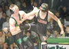 ROBERT DeBERRY/Frontiersman Colony's Levi Krueger attempts to
take down Wasilla's Jake Marshall during the 145 lb. weight class
at the Colony verses Wasilla duel Thursday at Colony High
Schoo