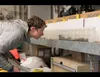 Steffi O'Daly looks at sea water samples from Bering Strait aboard the UAF research ship Sikuliaq. Andrew McDonnell