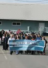 (ROBERT DeBERRY/Frontiersman) About 150 people marched through
the streets of Palmer during the noon hour to raise awareness of
domestic violence.