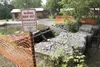 Several gabion flood mitigation structures have been installed
downstream from the dam on Lake Lucille to mitigate flooding, in
the event the dam should partially or totally fail before a
lon