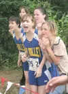 Susitna Valley cross country team members (left to right) Paris
White, Ashley Evans, Krystjana Timmers and Bailey Stevenson cheer
on a teammate during Saturday’s Bartlett Relays in Anchorage.