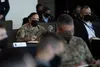 Sgt. Maj. Julie A.M Guerra, deputy chief of staff, G-2, listens to junior enlisted Soldiers brief at the U.S. Army People First Task Force Solarium at West Point, NY, March 19, 2021. The Sola