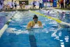 Katie Stark/For the FrontiersmanColony High's Alexis Mattson comes up for air during her second 25 of the girl’s 100-yard breaststroke at the Colony Invite during the 2018 season. Mattson won
