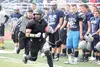 A Colony running back carries the ball down the sideline during the Chugiak Stampede Aug. 9 at Chugiak High School. Colony opens its 2014 season Aug. 15 against East Anchorage at Colony High.