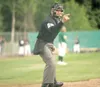 ROBERT DeBERRY/Frontiersman Umpire Jay Sanderson calls a strike
during Saturday’s Mat-Su Miners game at Hermon Brothers field in
Palmer.