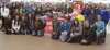 A group of students from Palmer Junior Middle School position themselves near a Walmart entrance after shopping for children benefiting from the Special Santa program last year. Courtesy Mari