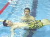 Photo courtesy of Guy Davis Aaron Cooper performs his weekly
physical therapy session at the Wasilla High School pool. Cooper
was injured last November in a snowmachine accident that left him
