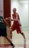 Wasilla guard Cody Schierman tries to work the ball past the
Service defense in the Wasilla Jamboree basketball tournament
Saturday. The round-robin tournament featured six teams with each
te