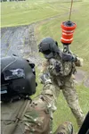 Soldiers with the Louisiana National Guard’s 1st Battalion, 244th Aviation Regiment, rehearse hoist operations to prepare for possible search and rescue missions ahead of Hurricane Ida in Ham