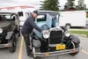 GREG JOHNSON/Frontiersman Jim Fredenhagen polishes up his 1929
Model A Ford in the parking lot of the Palmer Library Saturday
evening.