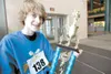 ROBERT DeBERRY/Frontiersman Academy Charter School eighth-grader
Forrest Lamb, 12, holds his trophy after winning the Alaska State
Spelling Bee Friday morning in Anchorage. Lamb correctly spe